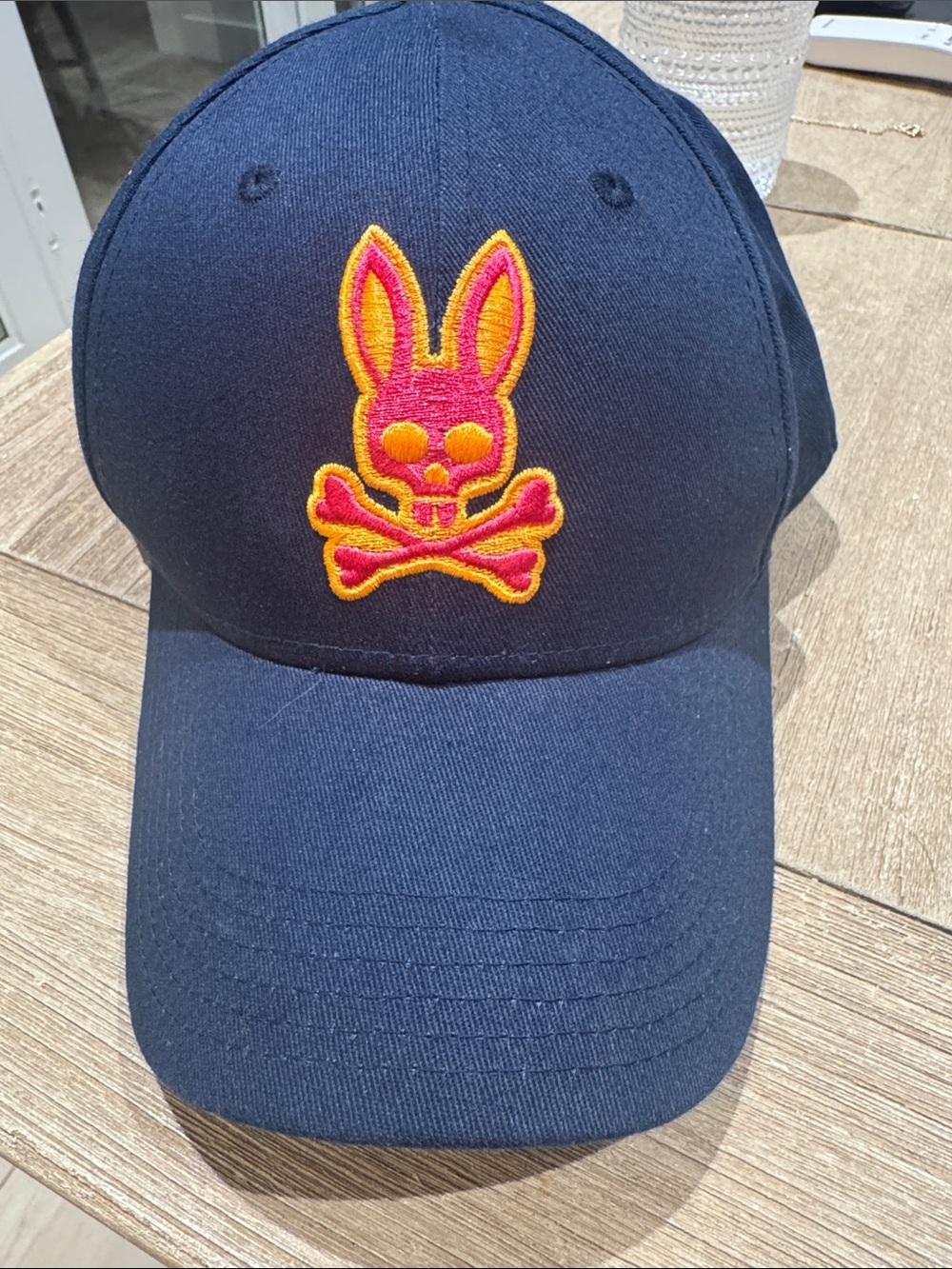 Psycho Bunny Navy Cap with Pink and Yellow Bunny Skull Logo